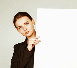 Image showing young pretty brunette girl with placard on white background wear