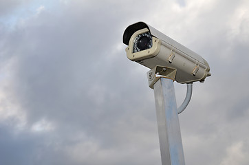 Image showing Security camera against a cloudy sky