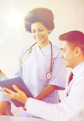 Image showing happy doctors meeting at hospital office