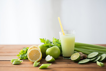 Image showing glass of green juice with fruits and vegetables