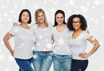 Image showing group of happy different women in white t-shirts