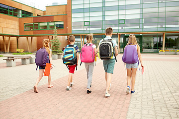 Image showing group of happy elementary school students walking