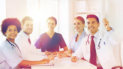 Image showing group of happy doctors on conference at hospital