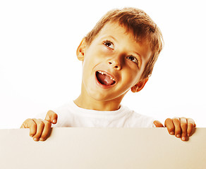 Image showing little cute boy holding empty shit to copyspace isolated close u