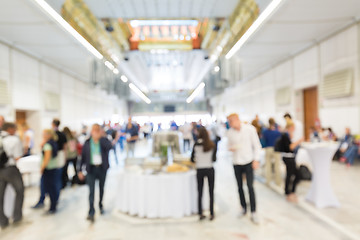 Image showing Abstract blurred people socializing during lunch break at business conference.