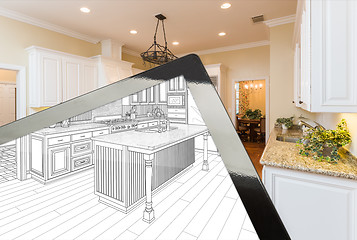 Image showing Computer Tablet Showing Drawing of Kitchen Photograph Behind