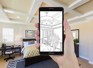 Image showing Hand Holding Smart Phone Displaying Drawing of Bedroom Photo Beh