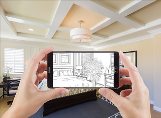 Image showing Hands Holding Smart Phone Displaying Drawing of Bedroom Photo Be