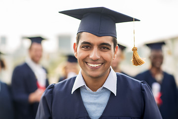 Image showing happy student or bachelor in mortar board