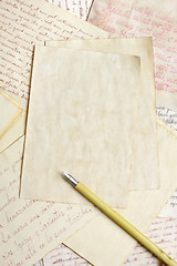 Image showing Aged empty paper sheets with vintage nib pen