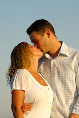 Image showing Young couple is kissing