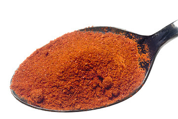 Image showing Spoonful of ground chilli powder
