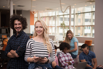 Image showing Multiethnic startup business team on meeting two in front of the