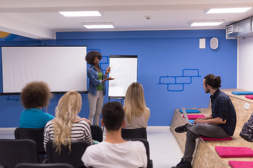 Image showing Black woman Speaker Seminar Corporate Business Meeting Concept