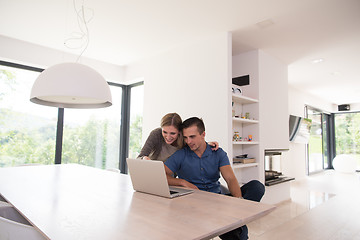 Image showing couple using laptop at home