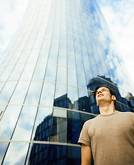 Image showing young man stand in front of modern business building