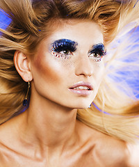 Image showing beauty young woman with creative make up, flying hair