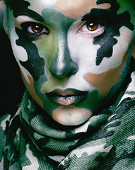 Image showing Beautiful young fashion woman with military style clothing and face paint make-up, khaki colors