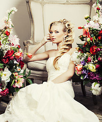 Image showing beauty young bride alone in luxury vintage interior with flowers