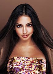 Image showing cute happy young indian woman in studio close up smiling, fashion mulatto