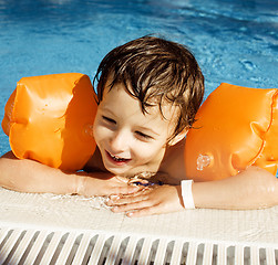 Image showing little cute boy in swimming pool