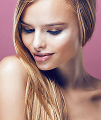 Image showing young pretty blonde woman with hairstyle close up