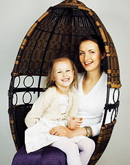 Image showing young mother with daughter at home interior