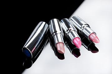 Image showing Metal Tubes With Lipstick