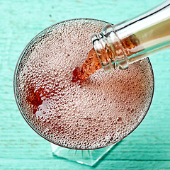 Image showing glass of red champagne