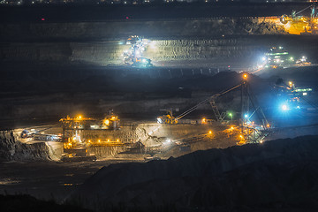 Image showing Large excavator machine in the mine