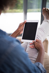 Image showing african american woman at home with digital tablet