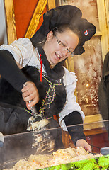 Image showing Alsatian Woman Preparing Food