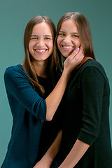 Image showing Portrait of two beautiful twin young women