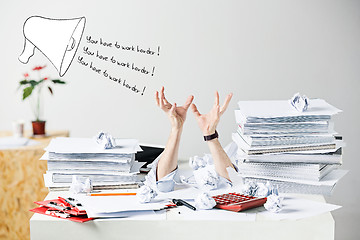 Image showing The many crumpled papers on desk of stressed male workplace