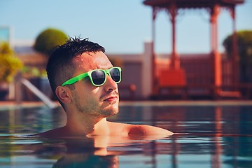 Image showing Sunny day in the pool