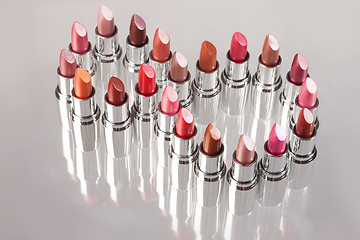 Image showing Metal Tubes With Lipstick