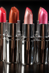 Image showing Metal Tubes With Lipstick