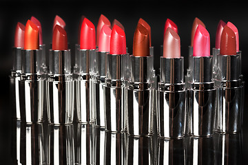 Image showing Metal Tubes With Lipstick