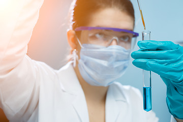 Image showing Laboratory assistant with test tube