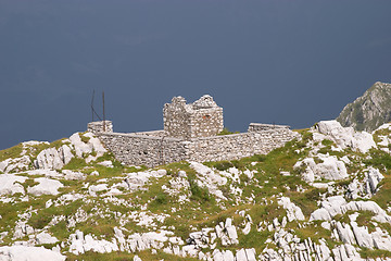 Image showing Old miners stony house during a storm, Val di Scalve, Italy