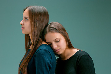 Image showing Portrait of two beautiful twin young women