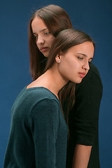 Image showing Portrait of two beautiful twin young women