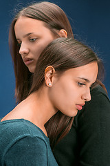 Image showing Portrait of two beautiful twin young women