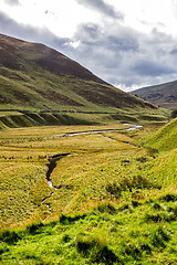 Image showing Landscape with hills and river