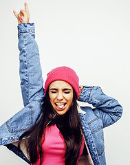 Image showing young happy smiling latin american teenage girl emotional posing on white background, lifestyle people concept 