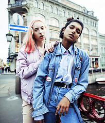 Image showing Two teenage girls infront of university building smiling, having