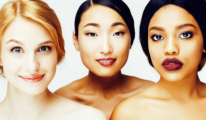 Image showing three different nation woman: asian, african-american, caucasian together isolated on white background happy smiling, diverse type on skin, lifestyle people concept 