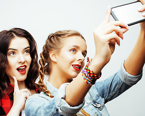 Image showing best friends teenage girls together having fun, posing emotional on white background, besties happy smiling, lifestyle people concept 