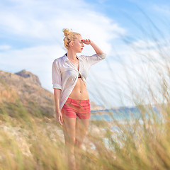 Image showing Free Happy Woman Enjoying Sun on Vacations.