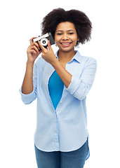 Image showing happy african american woman with film camera